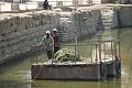 Workers in the pool where priests washed before offering sacrifices