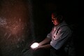 Our guide, Mohamed, catching a ray of light in a room in Karnak temple